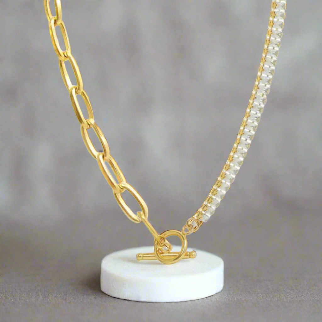 Gold plated stainless steel necklace, half chain links and half shiny pave crystals, a very luxurious piece to rock at any party