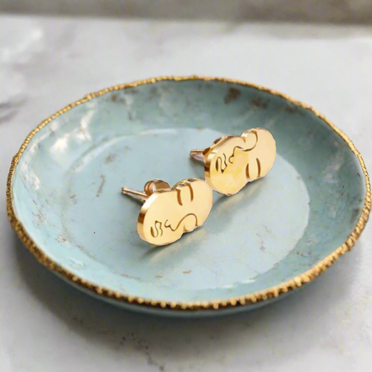 18 carat gold stainless steel, small stud earrings with the shape of a face
