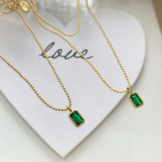 High-end 18k stainless steel ball chain with a small and dainty emerald  